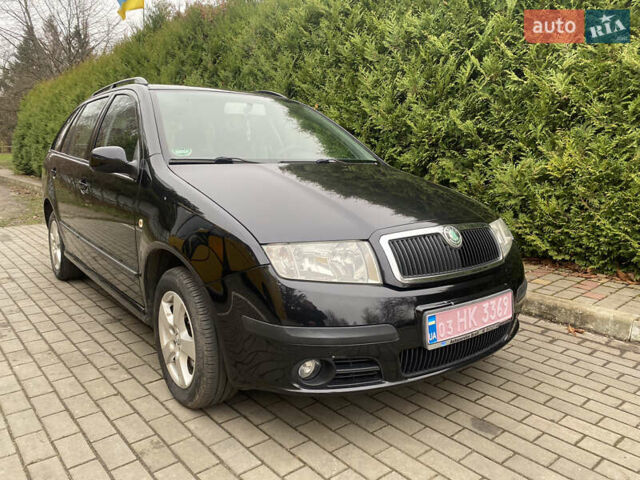 Черный Шкода Фабия, объемом двигателя 1.4 л и пробегом 246 тыс. км за 4399 $, фото 4 на Automoto.ua