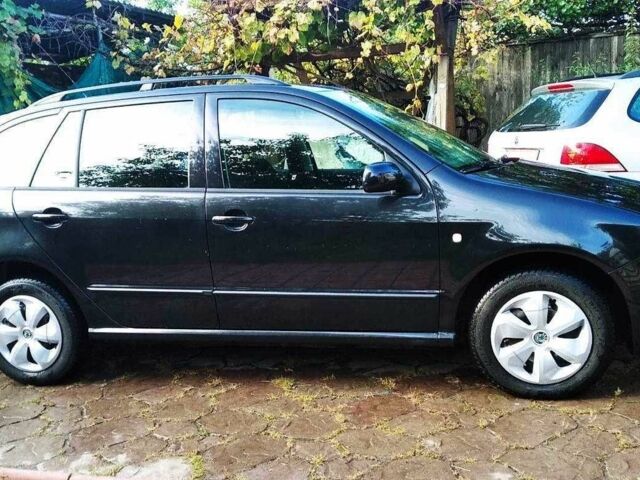 Черный Шкода Фабия, объемом двигателя 1.4 л и пробегом 219 тыс. км за 4699 $, фото 2 на Automoto.ua