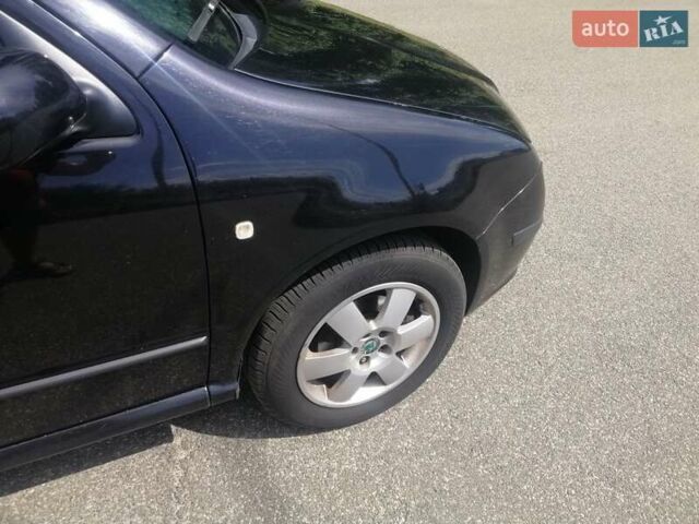 Черный Шкода Фабия, объемом двигателя 1.4 л и пробегом 235 тыс. км за 4700 $, фото 51 на Automoto.ua