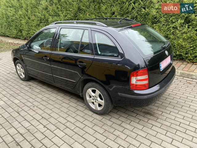 Черный Шкода Фабия, объемом двигателя 1.4 л и пробегом 246 тыс. км за 4399 $, фото 13 на Automoto.ua
