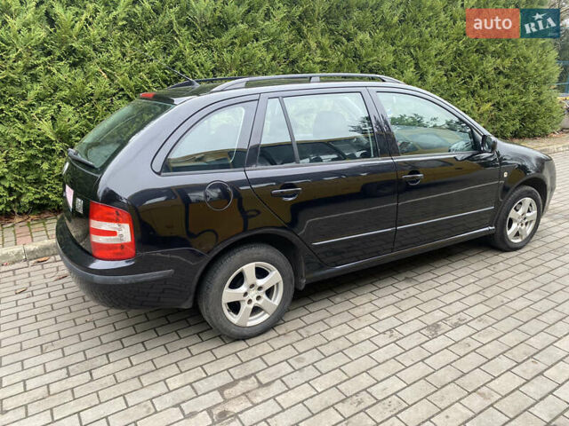Черный Шкода Фабия, объемом двигателя 1.4 л и пробегом 246 тыс. км за 4399 $, фото 1 на Automoto.ua