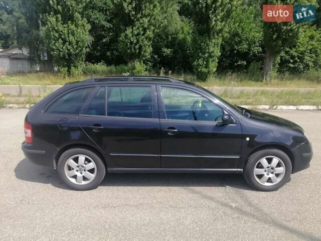 Черный Шкода Фабия, объемом двигателя 1.4 л и пробегом 235 тыс. км за 4700 $, фото 5 на Automoto.ua