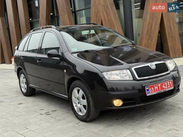 Черный Шкода Фабия, объемом двигателя 1.39 л и пробегом 249 тыс. км за 4550 $, фото 13 на Automoto.ua