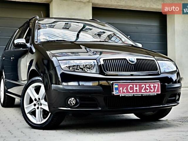 Черный Шкода Фабия, объемом двигателя 1.4 л и пробегом 170 тыс. км за 5050 $, фото 3 на Automoto.ua