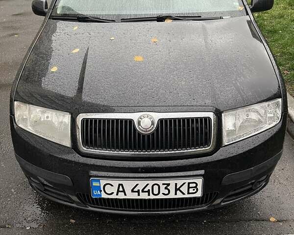Черный Шкода Фабия, объемом двигателя 1.39 л и пробегом 222 тыс. км за 4550 $, фото 5 на Automoto.ua