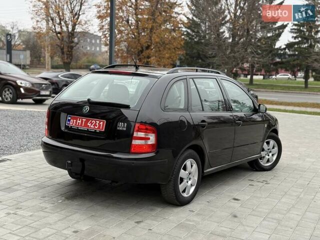 Черный Шкода Фабия, объемом двигателя 1.39 л и пробегом 249 тыс. км за 4550 $, фото 4 на Automoto.ua