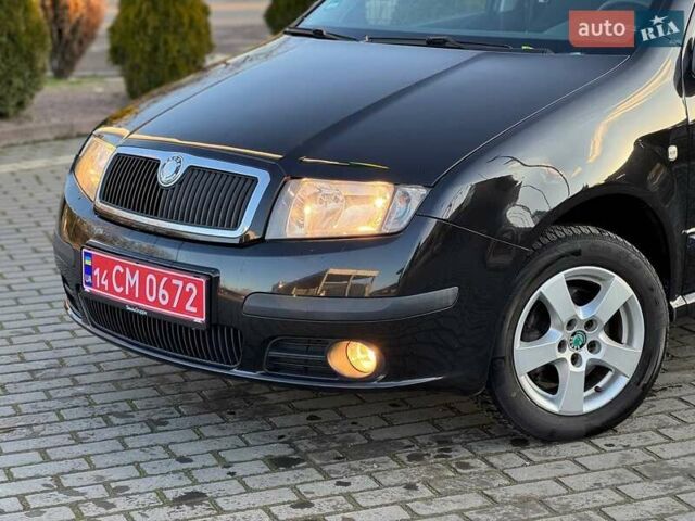 Чорний Шкода Фабія, об'ємом двигуна 1.39 л та пробігом 205 тис. км за 4450 $, фото 2 на Automoto.ua
