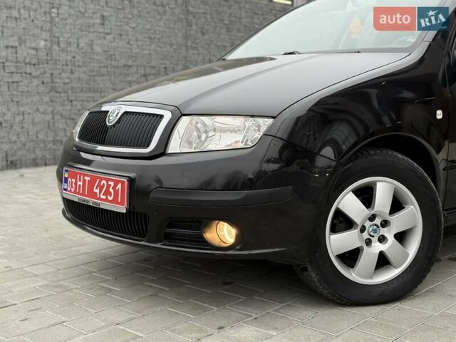 Черный Шкода Фабия, объемом двигателя 1.39 л и пробегом 249 тыс. км за 4550 $, фото 2 на Automoto.ua