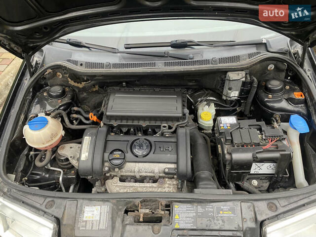 Черный Шкода Фабия, объемом двигателя 1.4 л и пробегом 246 тыс. км за 4399 $, фото 6 на Automoto.ua