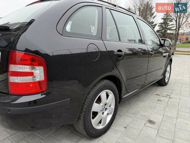 Черный Шкода Фабия, объемом двигателя 1.39 л и пробегом 249 тыс. км за 4550 $, фото 18 на Automoto.ua