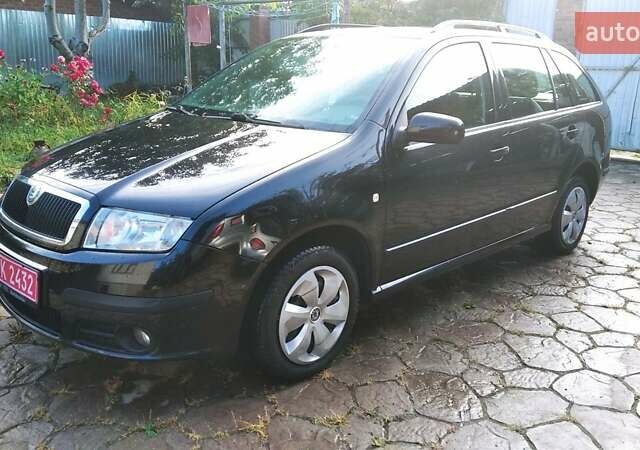 Черный Шкода Фабия, объемом двигателя 1.4 л и пробегом 219 тыс. км за 4699 $, фото 2 на Automoto.ua