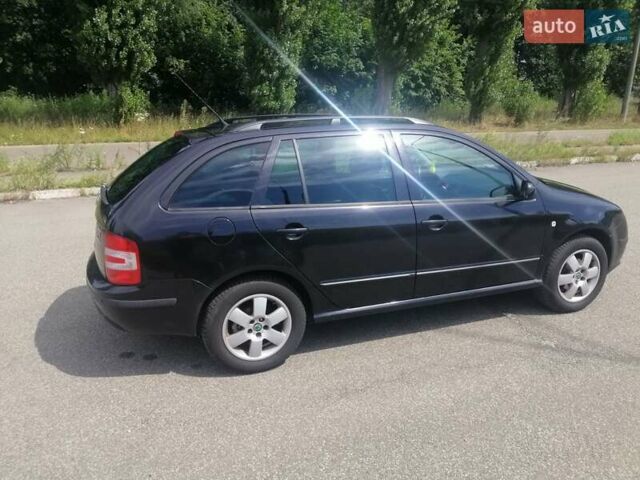Черный Шкода Фабия, объемом двигателя 1.4 л и пробегом 235 тыс. км за 4700 $, фото 10 на Automoto.ua