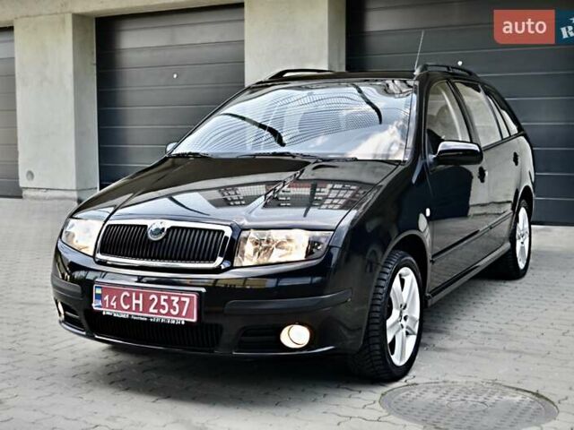 Черный Шкода Фабия, объемом двигателя 1.4 л и пробегом 170 тыс. км за 5050 $, фото 24 на Automoto.ua