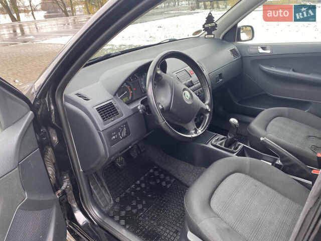 Чорний Шкода Фабія, об'ємом двигуна 1.39 л та пробігом 249 тис. км за 4550 $, фото 10 на Automoto.ua
