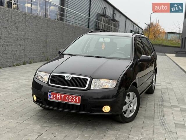 Черный Шкода Фабия, объемом двигателя 1.39 л и пробегом 249 тыс. км за 4550 $, фото 5 на Automoto.ua