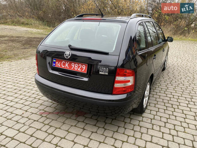 Черный Шкода Фабия, объемом двигателя 1.4 л и пробегом 171 тыс. км за 5350 $, фото 10 на Automoto.ua