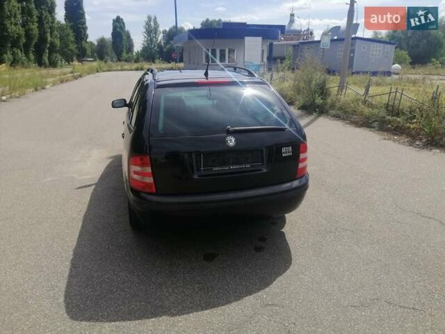 Черный Шкода Фабия, объемом двигателя 1.4 л и пробегом 235 тыс. км за 4700 $, фото 14 на Automoto.ua