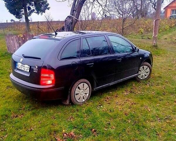 Черный Шкода Фабия, объемом двигателя 1.4 л и пробегом 220 тыс. км за 4444 $, фото 2 на Automoto.ua