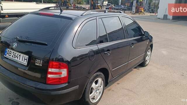 Черный Шкода Фабия, объемом двигателя 1.39 л и пробегом 197 тыс. км за 4500 $, фото 4 на Automoto.ua