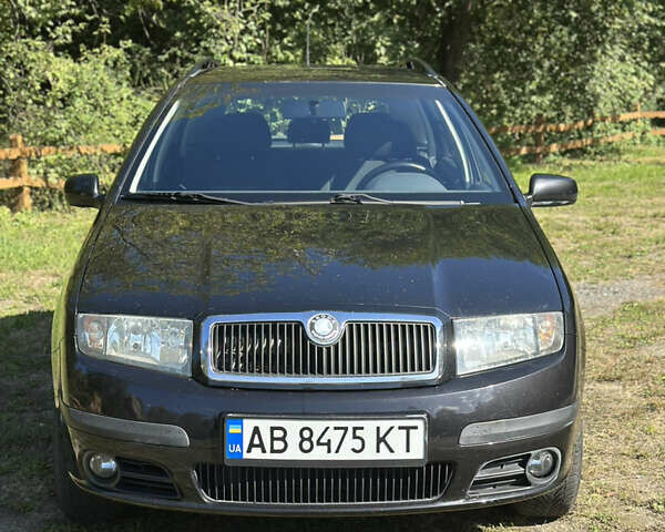 Черный Шкода Фабия, объемом двигателя 1.4 л и пробегом 180 тыс. км за 4800 $, фото 3 на Automoto.ua
