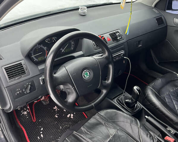 Черный Шкода Фабия, объемом двигателя 1.39 л и пробегом 302 тыс. км за 3000 $, фото 4 на Automoto.ua