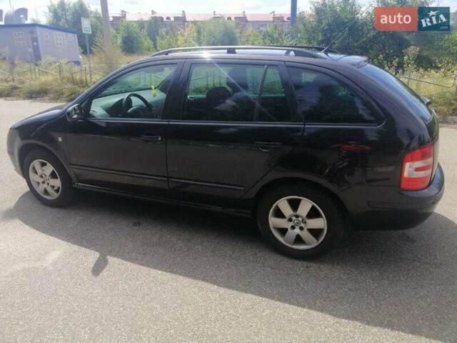 Черный Шкода Фабия, объемом двигателя 1.4 л и пробегом 235 тыс. км за 4700 $, фото 20 на Automoto.ua