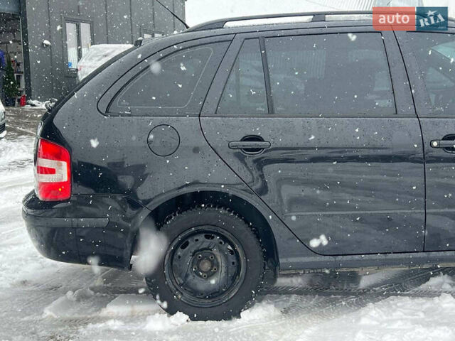 Черный Шкода Фабия, объемом двигателя 1.4 л и пробегом 276 тыс. км за 5440 $, фото 8 на Automoto.ua