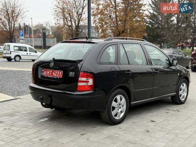 Черный Шкода Фабия, объемом двигателя 1.39 л и пробегом 249 тыс. км за 4550 $, фото 12 на Automoto.ua