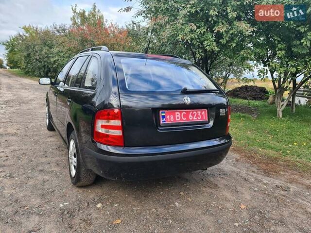 Черный Шкода Фабия, объемом двигателя 1.4 л и пробегом 196 тыс. км за 4699 $, фото 4 на Automoto.ua