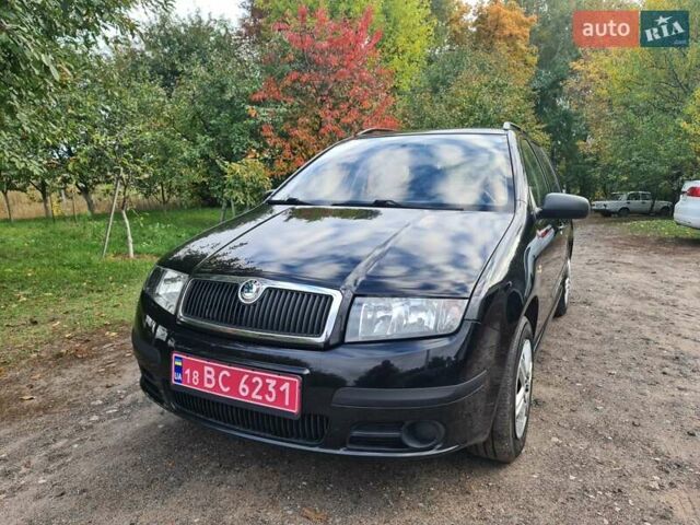 Черный Шкода Фабия, объемом двигателя 1.4 л и пробегом 196 тыс. км за 4699 $, фото 1 на Automoto.ua