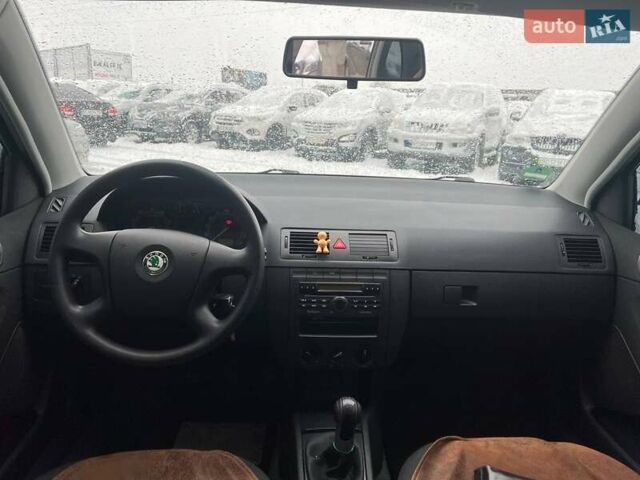 Черный Шкода Фабия, объемом двигателя 1.4 л и пробегом 276 тыс. км за 5440 $, фото 33 на Automoto.ua