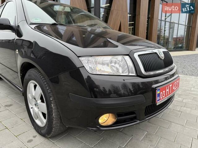 Черный Шкода Фабия, объемом двигателя 1.39 л и пробегом 249 тыс. км за 4550 $, фото 22 на Automoto.ua