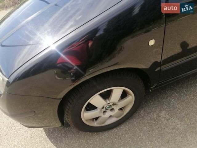 Черный Шкода Фабия, объемом двигателя 1.4 л и пробегом 235 тыс. км за 4700 $, фото 52 на Automoto.ua