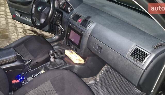 Черный Шкода Фабия, объемом двигателя 1.39 л и пробегом 250 тыс. км за 4300 $, фото 19 на Automoto.ua