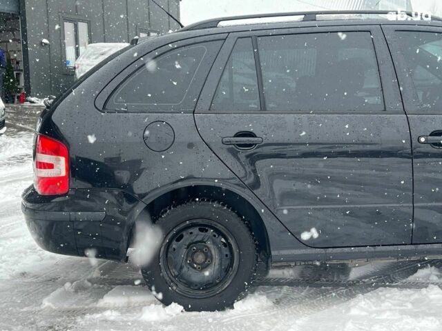 Черный Шкода Фабия, объемом двигателя 1.4 л и пробегом 276 тыс. км за 5440 $, фото 8 на Automoto.ua