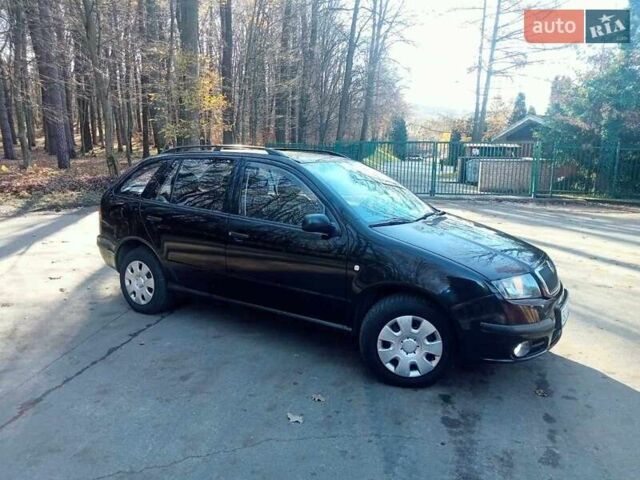 Черный Шкода Фабия, объемом двигателя 1.2 л и пробегом 207 тыс. км за 3100 $, фото 2 на Automoto.ua
