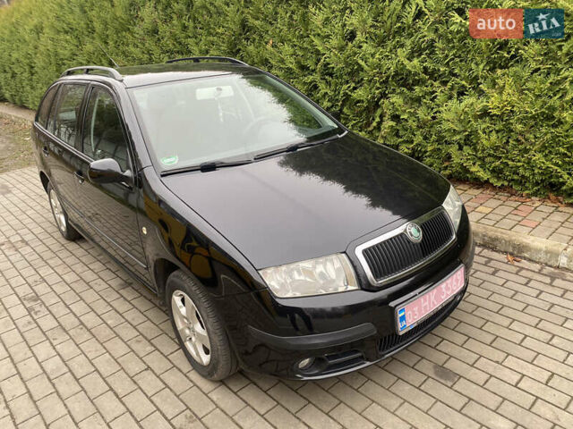 Черный Шкода Фабия, объемом двигателя 1.4 л и пробегом 246 тыс. км за 4399 $, фото 3 на Automoto.ua