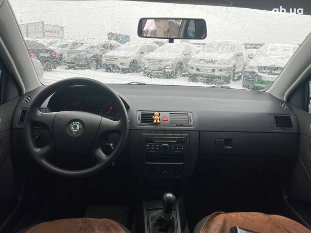 Черный Шкода Фабия, объемом двигателя 1.4 л и пробегом 276 тыс. км за 5440 $, фото 33 на Automoto.ua