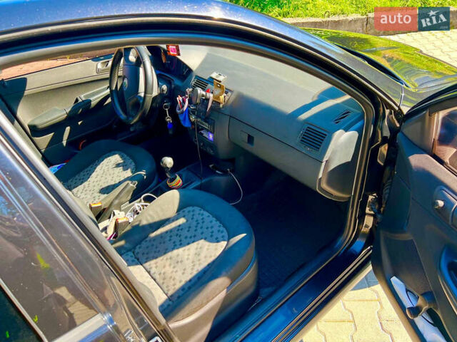 Черный Шкода Фабия, объемом двигателя 1.2 л и пробегом 262 тыс. км за 3800 $, фото 14 на Automoto.ua