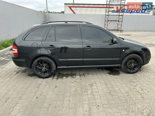 Черный Шкода Фабия, объемом двигателя 1.39 л и пробегом 226 тыс. км за 3900 $, фото 7 на Automoto.ua