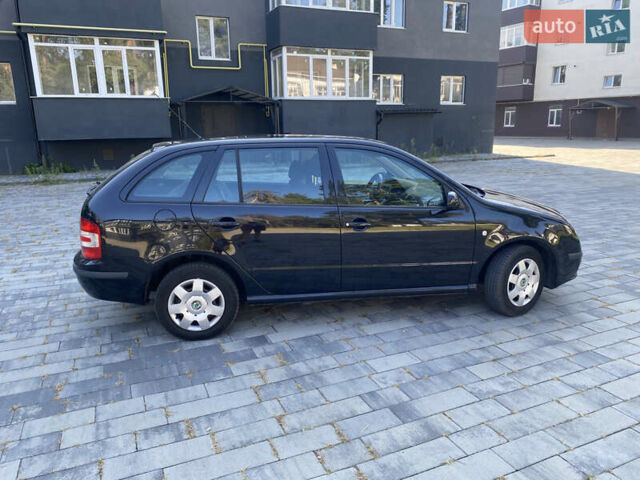 Черный Шкода Фабия, объемом двигателя 1.4 л и пробегом 201 тыс. км за 4750 $, фото 10 на Automoto.ua