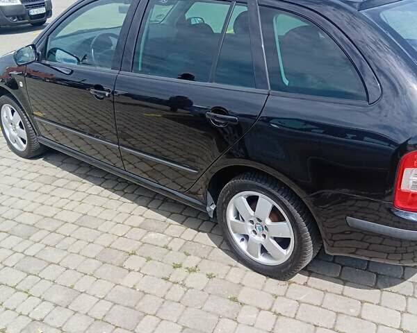 Черный Шкода Фабия, объемом двигателя 1.4 л и пробегом 200 тыс. км за 4550 $, фото 6 на Automoto.ua