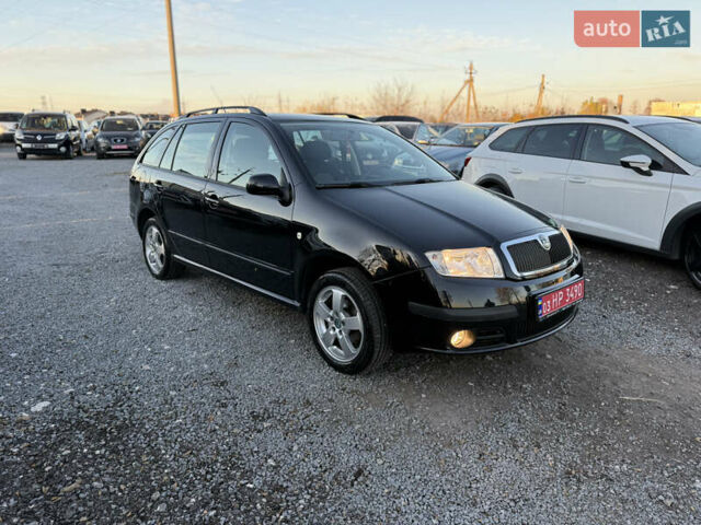 Черный Шкода Фабия, объемом двигателя 1.4 л и пробегом 200 тыс. км за 4999 $, фото 34 на Automoto.ua