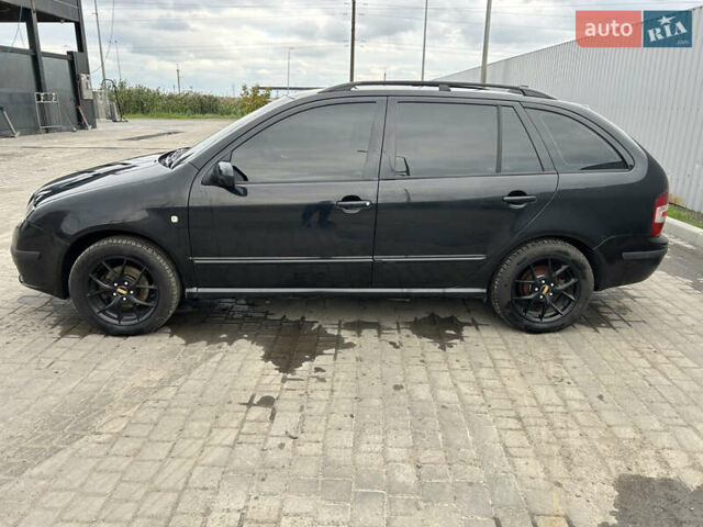 Черный Шкода Фабия, объемом двигателя 1.39 л и пробегом 226 тыс. км за 3900 $, фото 3 на Automoto.ua