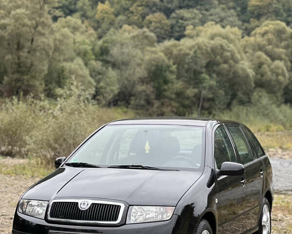 Черный Шкода Фабия, объемом двигателя 1.4 л и пробегом 220 тыс. км за 4450 $, фото 9 на Automoto.ua