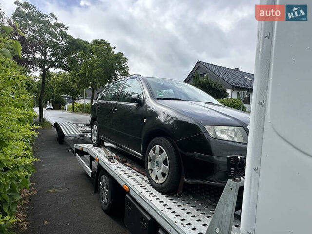Черный Шкода Фабия, объемом двигателя 1.4 л и пробегом 230 тыс. км за 3850 $, фото 2 на Automoto.ua