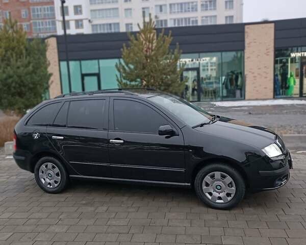 Черный Шкода Фабия, объемом двигателя 1.39 л и пробегом 193 тыс. км за 5500 $, фото 6 на Automoto.ua