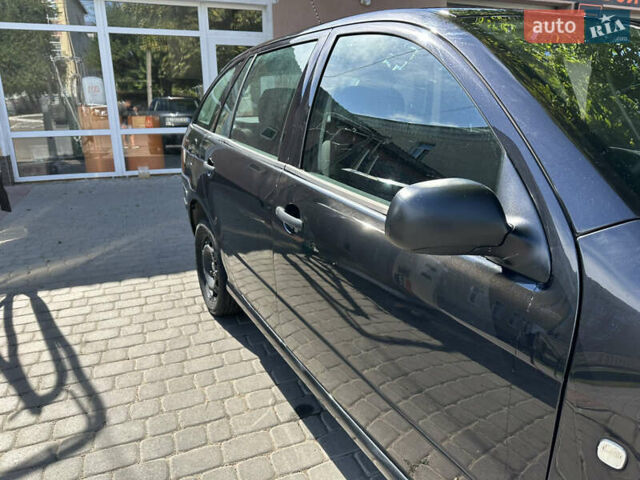 Черный Шкода Фабия, объемом двигателя 1.2 л и пробегом 170 тыс. км за 3700 $, фото 5 на Automoto.ua