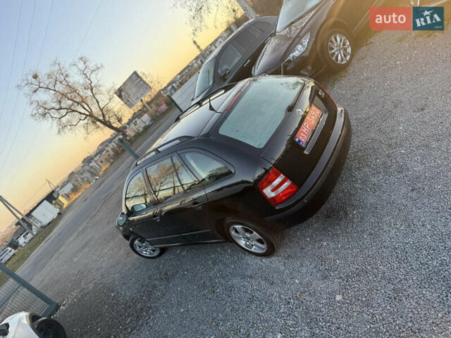 Черный Шкода Фабия, объемом двигателя 1.4 л и пробегом 200 тыс. км за 4999 $, фото 4 на Automoto.ua