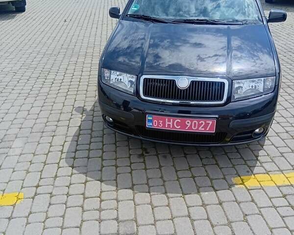 Черный Шкода Фабия, объемом двигателя 1.4 л и пробегом 200 тыс. км за 4550 $, фото 2 на Automoto.ua